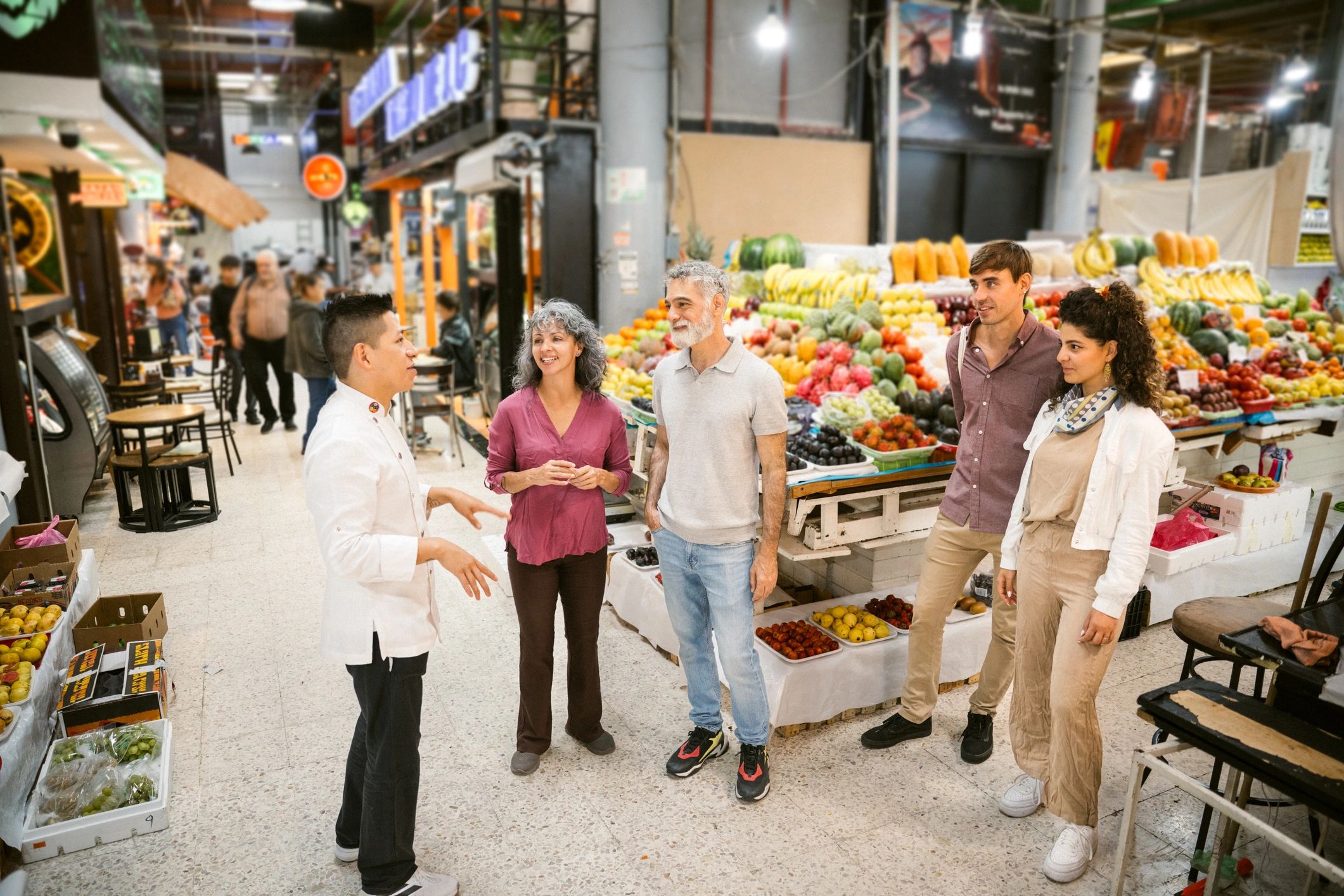 Chef leading a culinary market tour