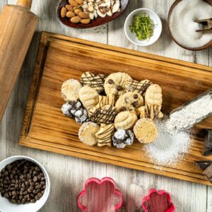 High angle view of arrangement of baking ingredients on a wooden table